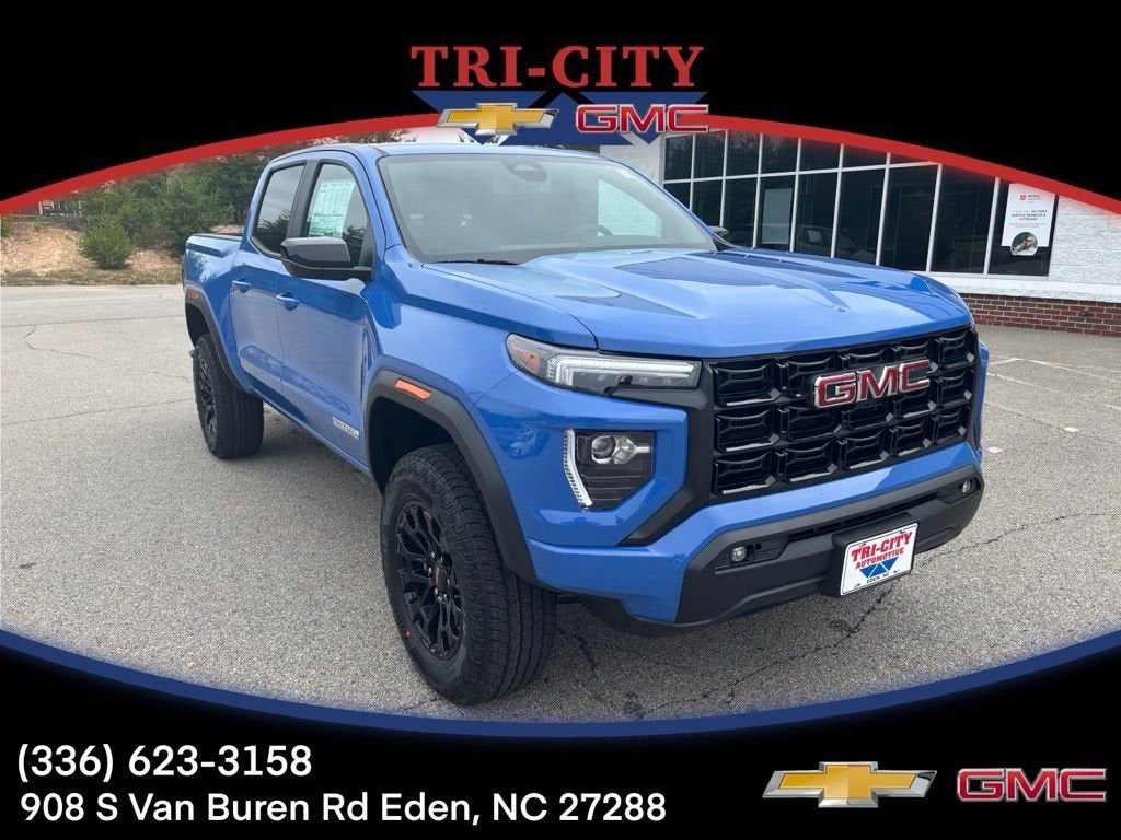 2026 GMC Canyon Elevation in Rapids Metallic — front three-quarter view